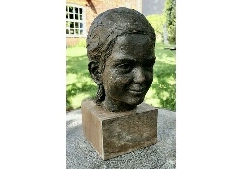 Artist’s Terracotta Bust Of A Girl With A Pony Tail