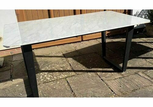 A Contemporary Dining Or Consul Table With Carrera Marble Top.