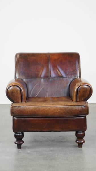 Vintage Comfortable Sheepskin Armchair In Good Condition With Beautiful Colours And Charming Front Legs photo furniture
