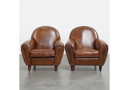 Set Of 2 Stylish And Timeless Cowhide Designer Armchairs With Beautiful Round Shapes