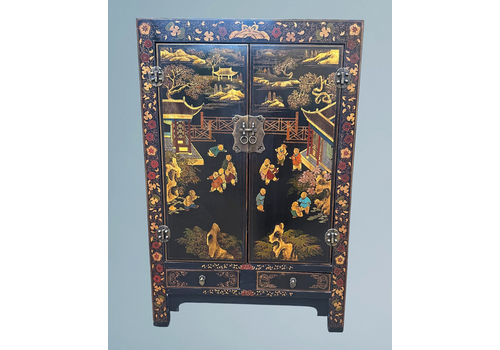 An Oriental Ebonised And Lacquered Two Door Cupboard