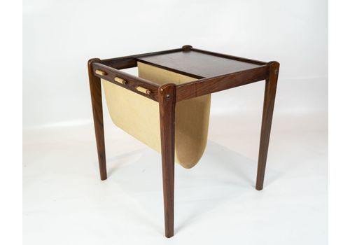 Small Newspaper Holder / Lamp Table In Rosewood Of Danish Design From The 1960s.