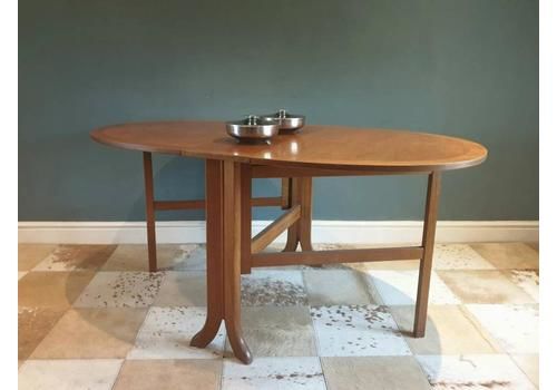 A Teak Dropleaf/Gateleg Dining Table By Nathan.