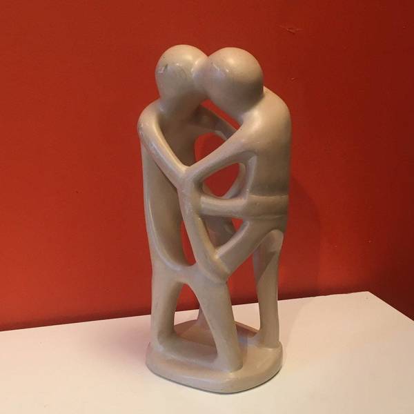 Contemporary Abstract Stone Sculpture Of Lovers Embrace In And Kiss